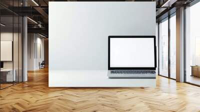 Futuristic laptop on left side of light gray background, space for copy Wall mural